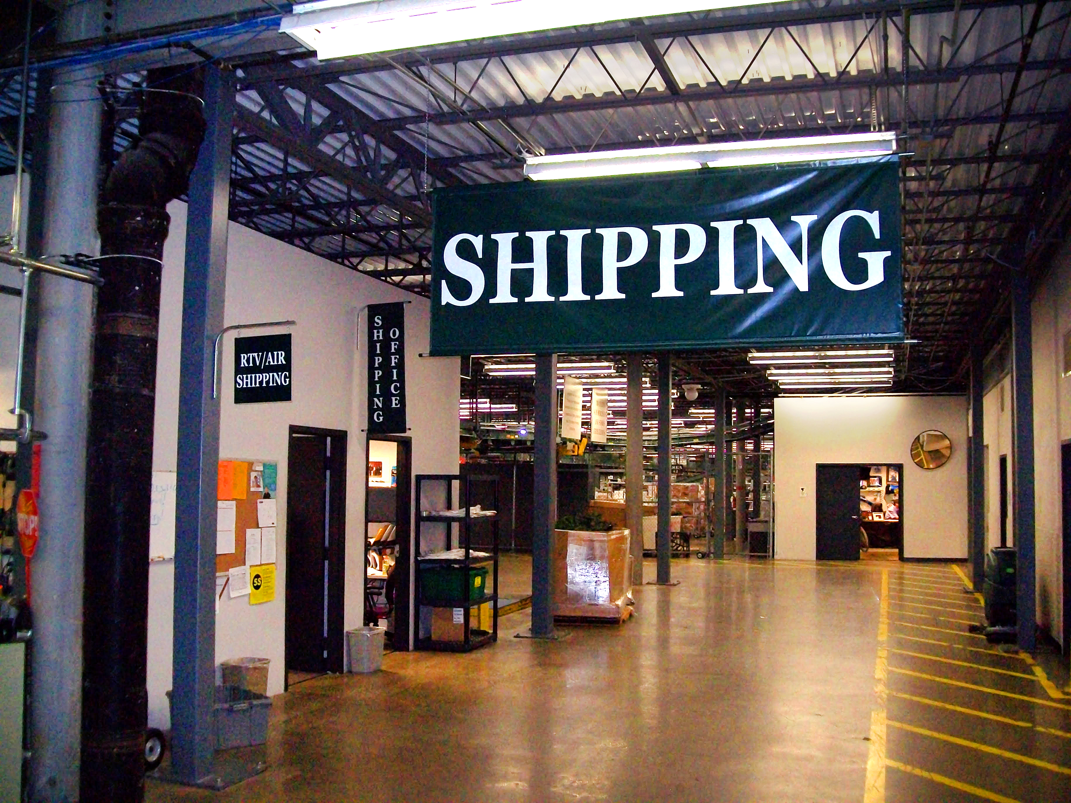 shipping banner hanging from ceiling